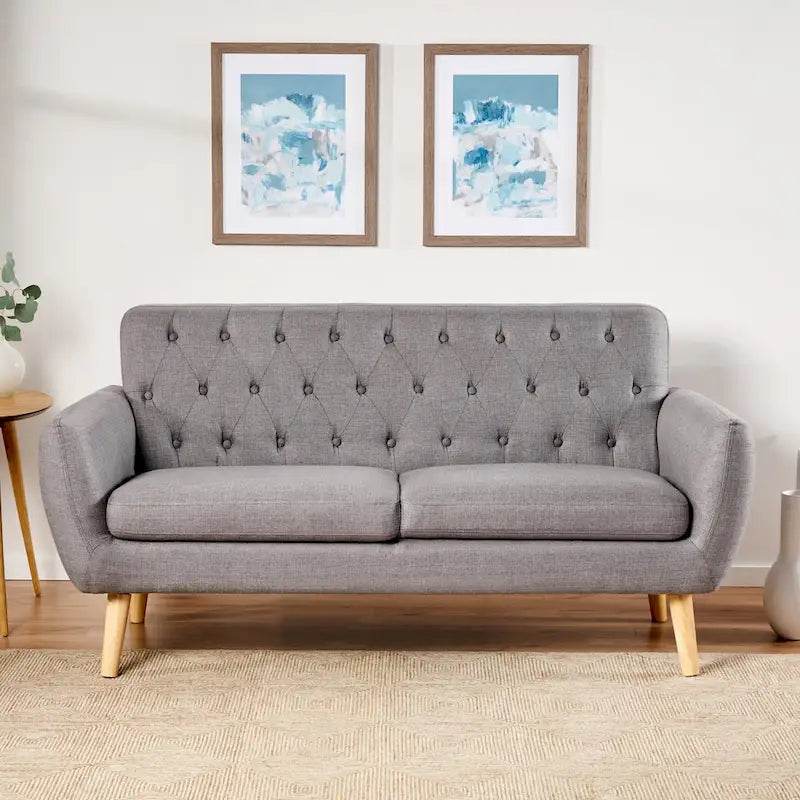 Petit canapé de style Mid-Century Modern avec dossier capitonné et pieds en bois inclinés