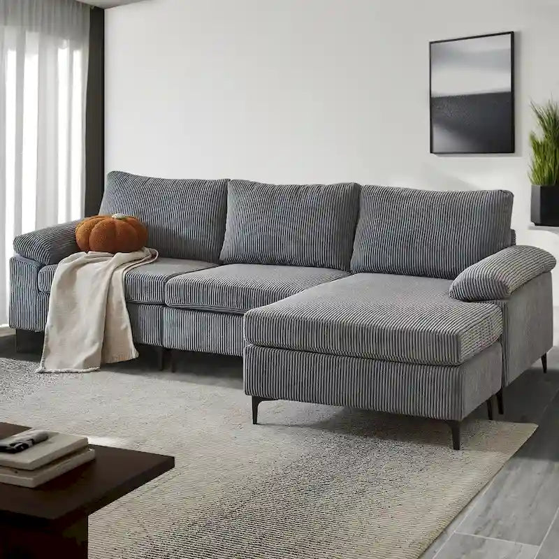 Canapé d'angle en velours côtelé avec ottomane réversible et accoudoirs larges